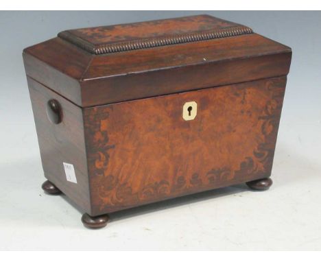 A 19th century rosewood tea caddy, the hinged lid enclosing a two partition interior, 15 x 20 x 12.5cm