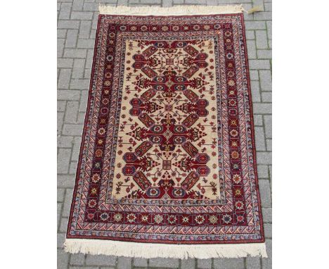 zzz A Peripedil rug, 206 x 128cm A Peripedil rug, 206 x 128cmThis lot has been imported from outside the UK and is therefore 
