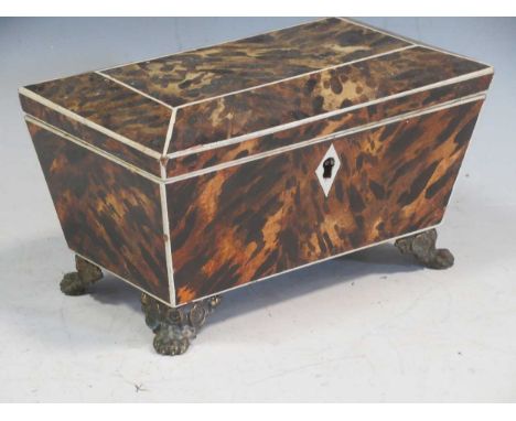 A simulated tortoiseshell and ivory tea caddy, 10 x 18 x 11cm