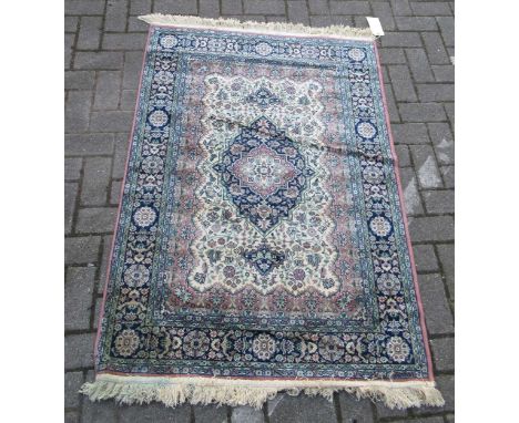 zzz A Persian style rug, a pink ground rug, a black ground rug and another (4) A Persian style rug 147 x 100cm, a pink ground