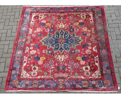 zzz A Heriz type rug 204 x 195cm A Heriz type rug 204 x 195cmThis lot has been imported from outside the UK and is therefore 