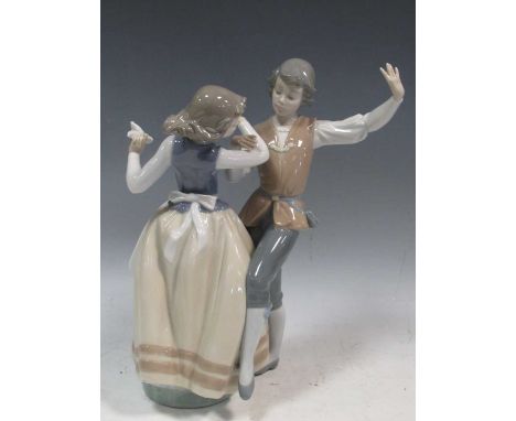 A large Lladro model of the two dancers, 30cm highMinor markings to the exterior commensurate with age and use. Good conditio
