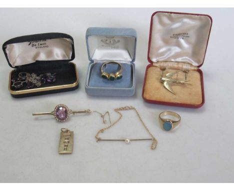 An opal doublet ring stamped '375', three brooches hallmarked or assessed as 9ct gold, a hallmarked 9ct gold ingot pendant, g