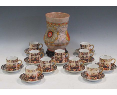 A set of 11 Royal Albert Imari coffee cans and 12 saucers; together with a Charlotte Rhead Crown Ducal vase