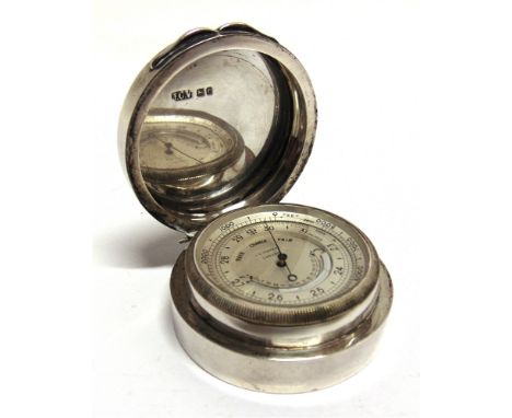 A SILVER CASED POCKET ANEROID BAROMETER &amp; THERMOMETER BY J.C. VICKERY  London, 1912, the silvered dial with a rotating be