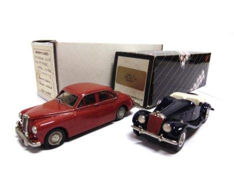 [WHITE METAL]. TWO MODEL CARS  comprising a Western Models No.WMS12, 1953 M.G. TF Midget, dark blue, mint, with self-fit wind