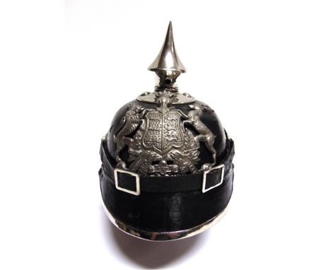 AN IMPERIAL GERMAN ENLISTED MAN'S PICKLEHAUBE  of regulation pattern, bearing a silver Wurttemburg Wappen helmet plate and pl