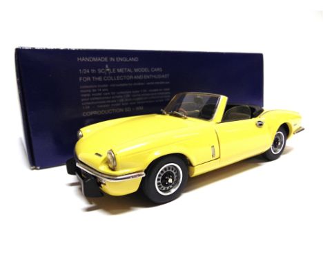 [WHITE METAL]. A 1/24 SCALE WESTERN MODELS (SPIELWAREN DANHAUSEN) TRIUMPH SPITFIRE  yellow, mint, boxed.
