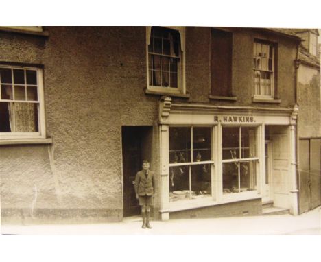 POSTCARDS - SOMERSET  Eighty-one cards, including real photographic views of a shopfront, R. Hawkins (inscribed verso Wivelis