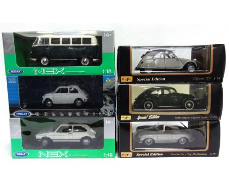 SIX 1/18 SCALE DIECAST MODEL CARS  including Volkswagens, each mint or near mint and boxed. 