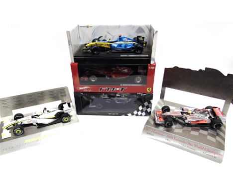 SEVEN 1/18 SCALE DIECAST MODEL FORMULA 1 RACING CARS  together with a 1/18 scale Le Mans racing car, two of them boxed, (2). 