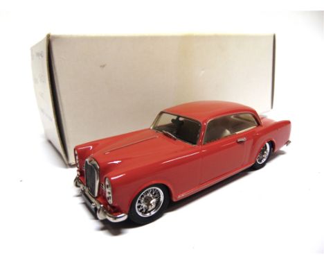 [WHITE METAL]. A 1/43 SCALE TOP MARQUES 1967 ALVIS TF 21 'GRABER' SALOON  red, near mint (lacking one windscreen wiper), boxe