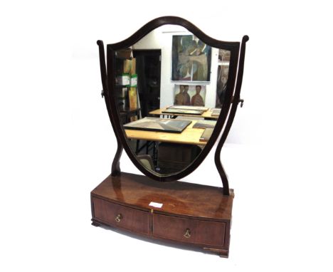 A 19TH CENTURY MAHOGANY DRESSING TABLE MIRROR  with shield shaped mirror, the bow front base fitted with two drawers, 46cm wi