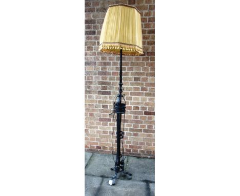 A WROUGHT IRON STANDARD LAMP  in the Arts & Crafts style, 180cm high