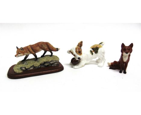 A ROYAL DOULTON FIGURE OF A DOG WITH BALL  a Beswick fox and a Border Fine Arts fox model M21 (3)