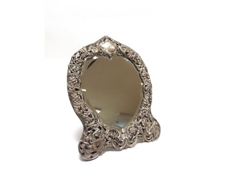 A LATE VICTORIAN SILVER EASEL BACK DRESSING TABLE MIRROR  by Gibson & Langman, London 189 , the heart shaped bevelled mirror 