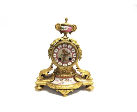 A 19TH CENTURY FRENCH ORMOLU MANTLE CLOCK  in classical style, with urn finial above face painted with cherubs, the 8-day mov