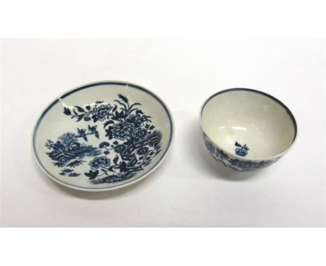 AN EARLY WORCESTER TEA BOWL AND SAUCER  in the 'Fence' pattern, crescent marks to base, the saucer 10.5cm diameter, the tea b