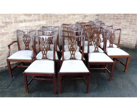 A SET OF SIXTEEN CHIPPENDALE STYLE MAHOGANY FRAMED DINING CAHIRS  with openwork splat back, upholstered drop-in seats and rai