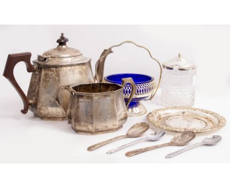 A SILVER OCTAGONAL TEAPOT with bakelite handle and knop together with matching sugar basin, originally retailed by Rowell of 