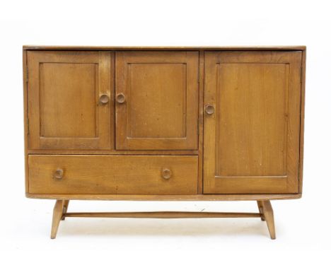 AN ERCOL LIGHT ELM SIDEBOARD with three cupboards, a single drawer and turned supports, 114cm wide x 52cm deep x 81.5cm high