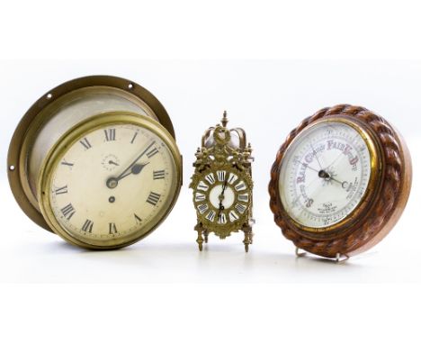 A LATE 19TH CENTURY / EARLY 20TH CENTURY BRASS CASED SHIPS CLOCK the enamelled dial with Arabic numerals and a subsidiary dia