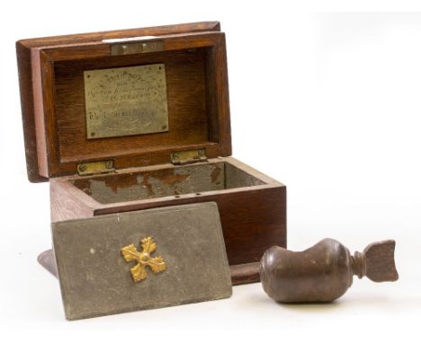 AN ANTIQUE TREEN NUT CRACKER 9cm in length and a 19th century oak tobacco box made from Bishop's Gate church by J.D.Meadows, 