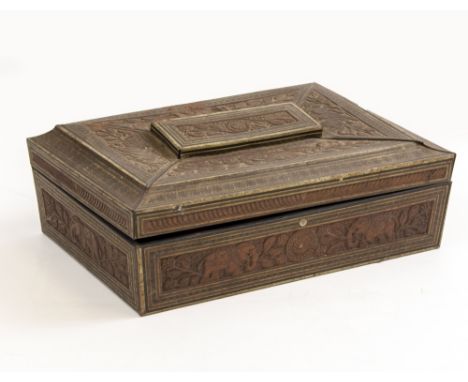 A HUNTLEY &amp; PALMERS BISCUIT TIN in the form of a vizagapatam box, containing various sea shells, 25.5cm wide together wit
