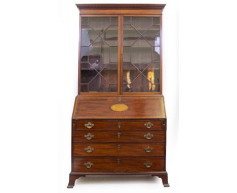 A GEORGE III MAHOGANY AND SATINWOOD CROSSBANDED BUREAU BOOKCASE with twin astrigal glazed doors above a fall front, with an i