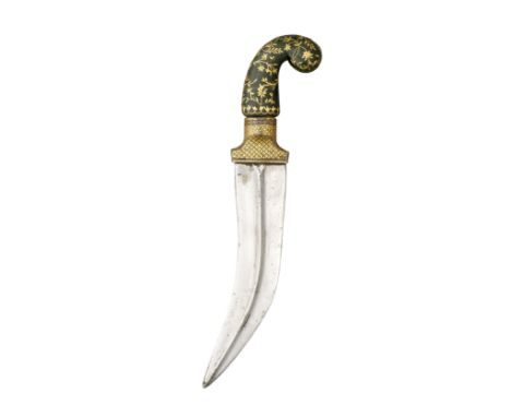 with double-edged jambiya blade formed with a medial ridge, russet iron hilt decorated with a dense arrangement of minute gil