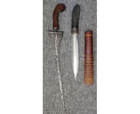 the first with tapering blade and hardwood hilt incorporating two small scrollwork panels; the second with single-edged fulle