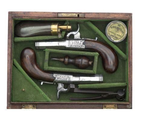 each with signed octagonal turn-off barrel engraved with a band of foliage around the muzzle, engraved rounded action decorat
