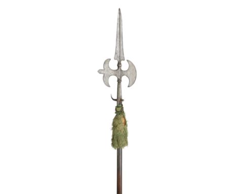 with tapering double-edged terminal blade formed with a medial ridge and engraved with chevrons on each face, border-engraved
