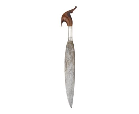 the first a Philippine machete (barong), with single-edged leaf-shaped blade, silver ferule and carved wooden hilt; the secon