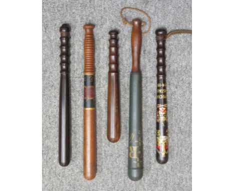of turned wood, two plain; the third painted green with 'VR'; the fourth with 'GR' crowned and 'Special Constable 1914-19' in