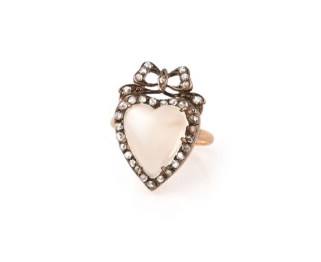 A late Victorian moonstone and diamond heart, later converted to a ring, the cabochon moonstone heart within diamond border a