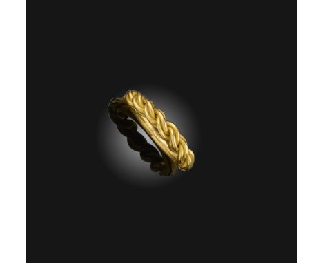 A rare gold ring, Viking, 9th-11th century, the front of woven design in high carat gold, size Q, 7.8 grams Rings and arm ban