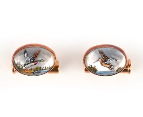 A pair of 18ct gold and rock crystal reverse intaglio cufflinks, Deakin and Francis, each collet-set with a rock crystal reve