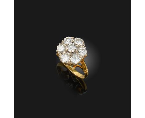 A diamond cluster ring, set with 7 round brilliant-cut diamonds in 18ct white gold, total approximate diamond weight 1.25cts,
