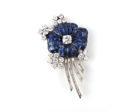 A sapphire and diamond flowerhead brooch, set with a central diamond and calibre-cut sapphire petals, with further circular a