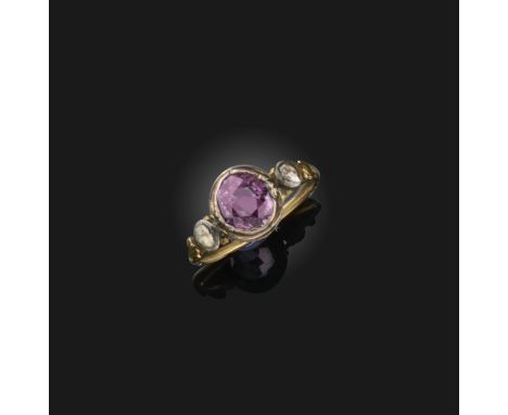 A spinel and diamond ring, collet-set with a cushion-shaped purple spinel, the shoulders set with rose-cut diamonds, to a spl