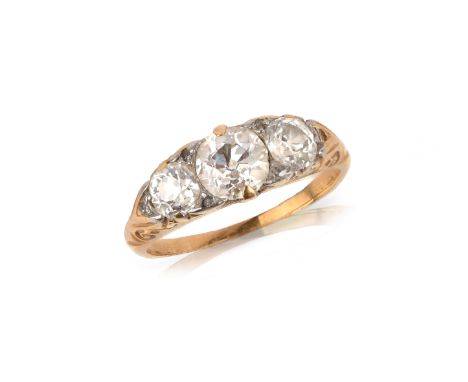 A Victorian diamond three stone ring, set with three graduated old circular-cut diamonds with diamond pointers (one missing) 