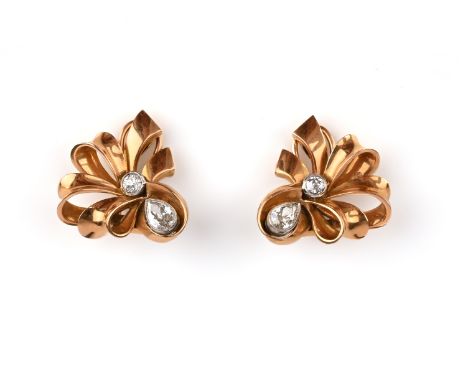 A pair of Retro gold and diamond ear clips, 1940s, each designed as a ribbon bow, set with pear-shaped and circular-cut diamo