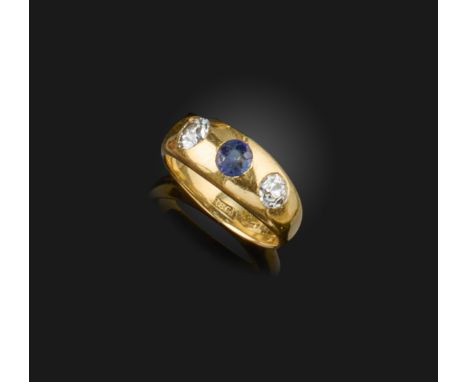 A Victorian sapphire and diamond gypsy ring, the cushion-shaped sapphire and diamonds rubover-set in yellow gold, stamped 18c