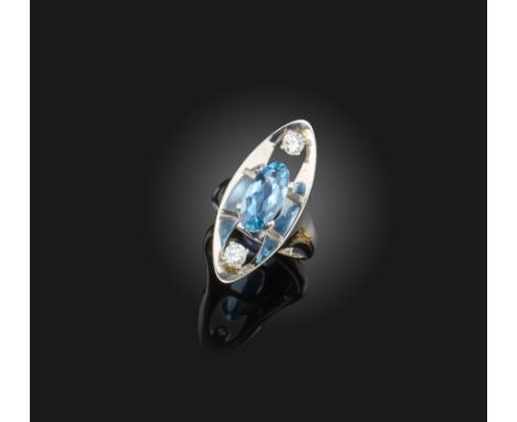 An aquamarine and diamond ring by Peter Lyon, set with an oval-shaped aquamarine and two round brilliant-cut diamonds in 18ct