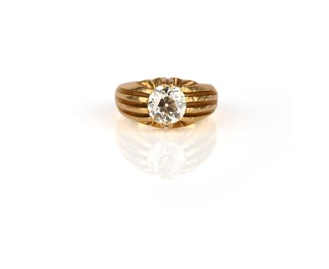 A diamond ring, claw-set with a circular-cut diamond weighing approximately 2.20 carats, to a fluted gold band, size R, stamp
