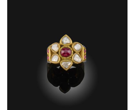 An Indian ruby and diamond set gold ring, designed as a flower set with lasqué-cut diamonds and centred on a rose-cut ruby, t