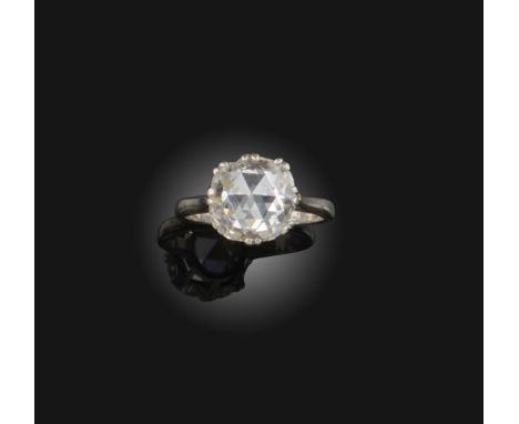 A diamond solitaire ring, the rose-cut diamond weighs approximately 1.30cts, claw-set in platinum, size J 1/2