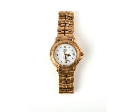 A gentleman's 18ct gold chronometer wristwatch, Tag Heuer, the white circular dial with date wheel, the hands and hour indica
