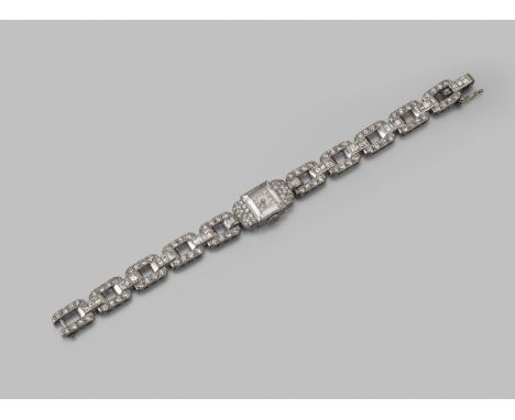 An extremely rare Art Deco platinum and diamond wristwatch with portrait-cut diamond crystal, Van Cleef &amp; Arpels, 1930s, 